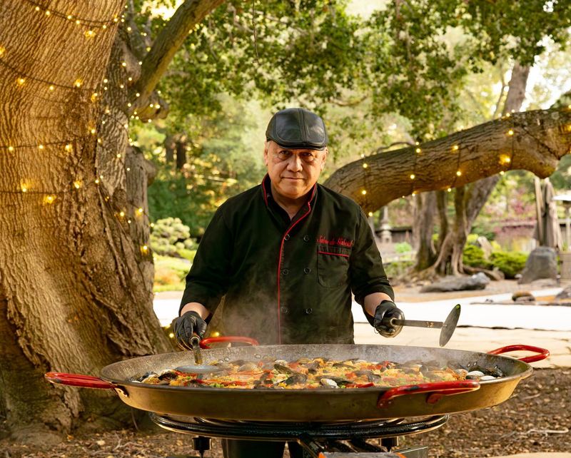 Chef Gabriel cooking paella